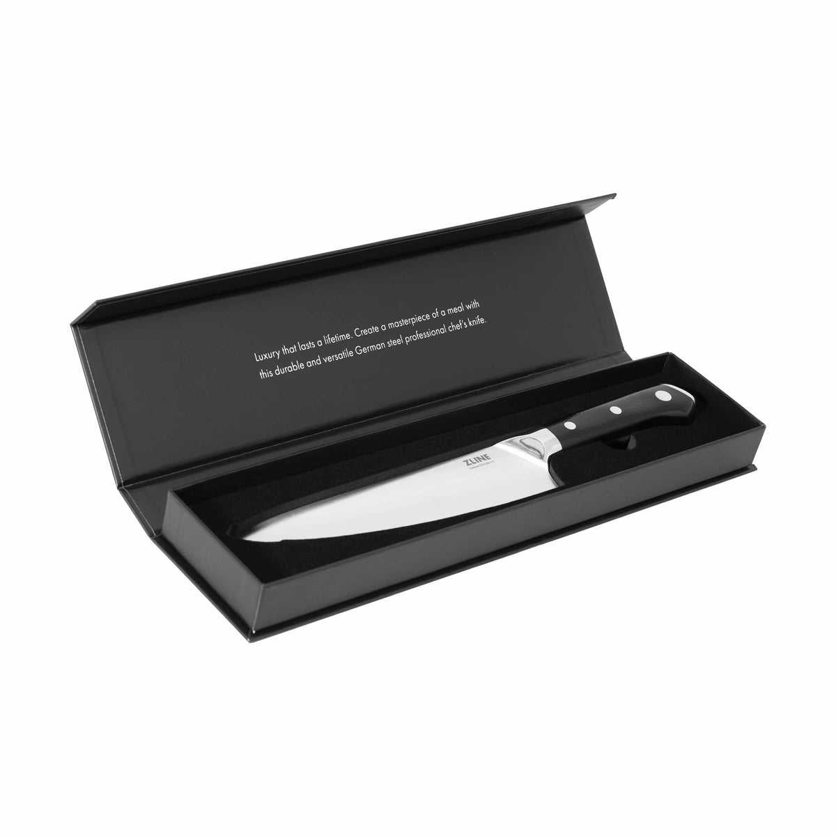 Chef’s knife in open gift box, featuring stainless blade and black dotted handle