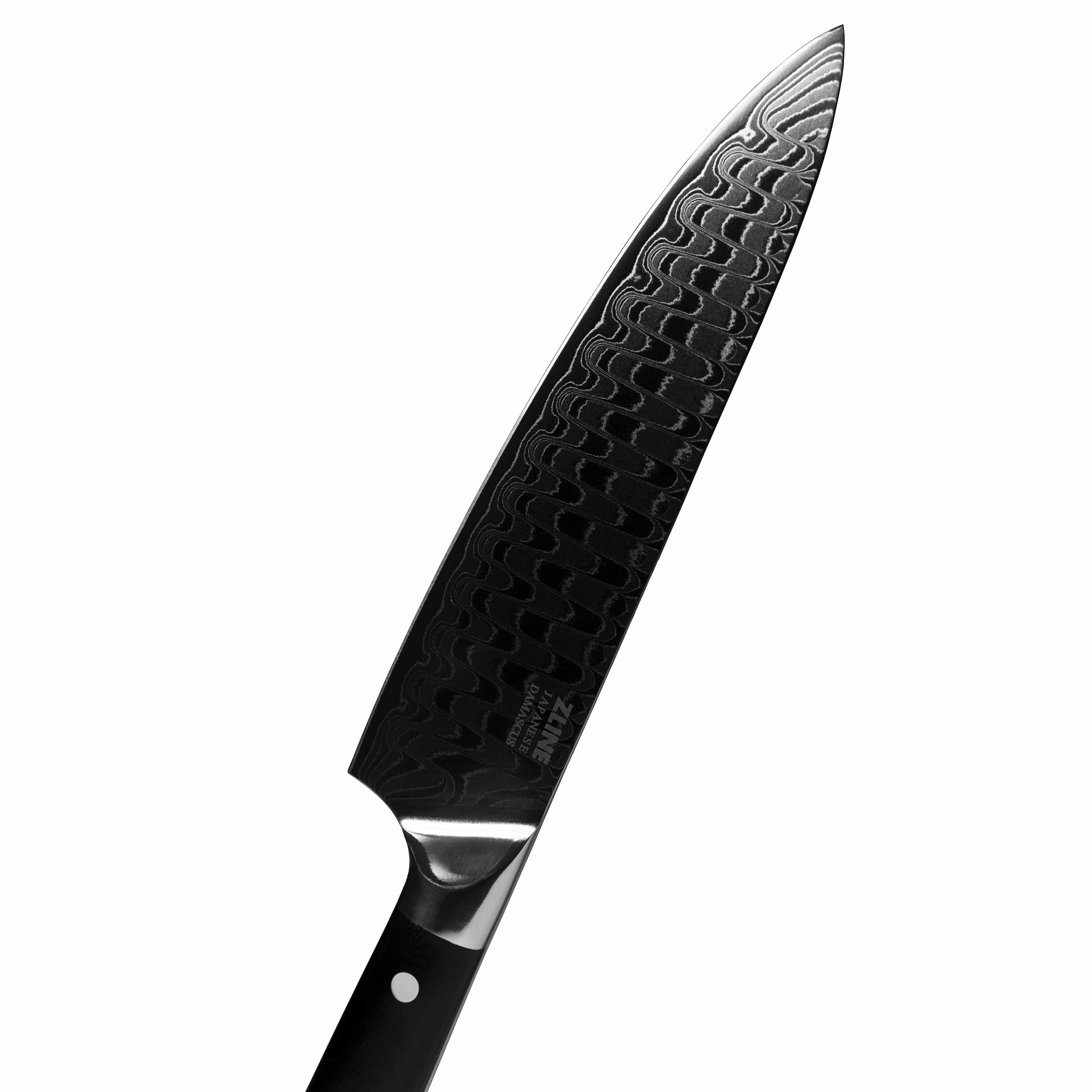 Damascus chef’s knife angled view, black handle with rivets and dark patterned blade
