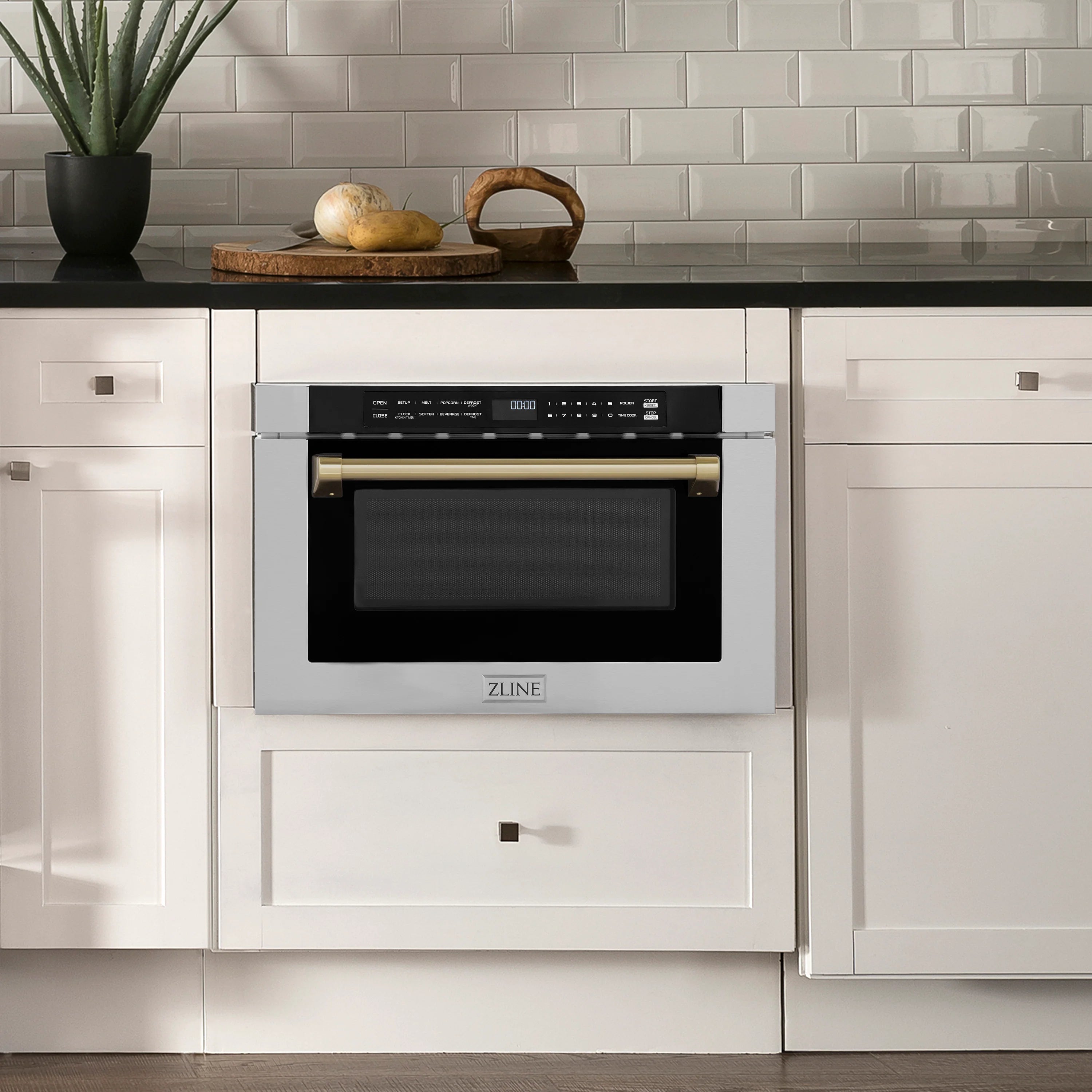 Built-in microwave drawer with stainless steel front and champagne bronze handle, black glass door
