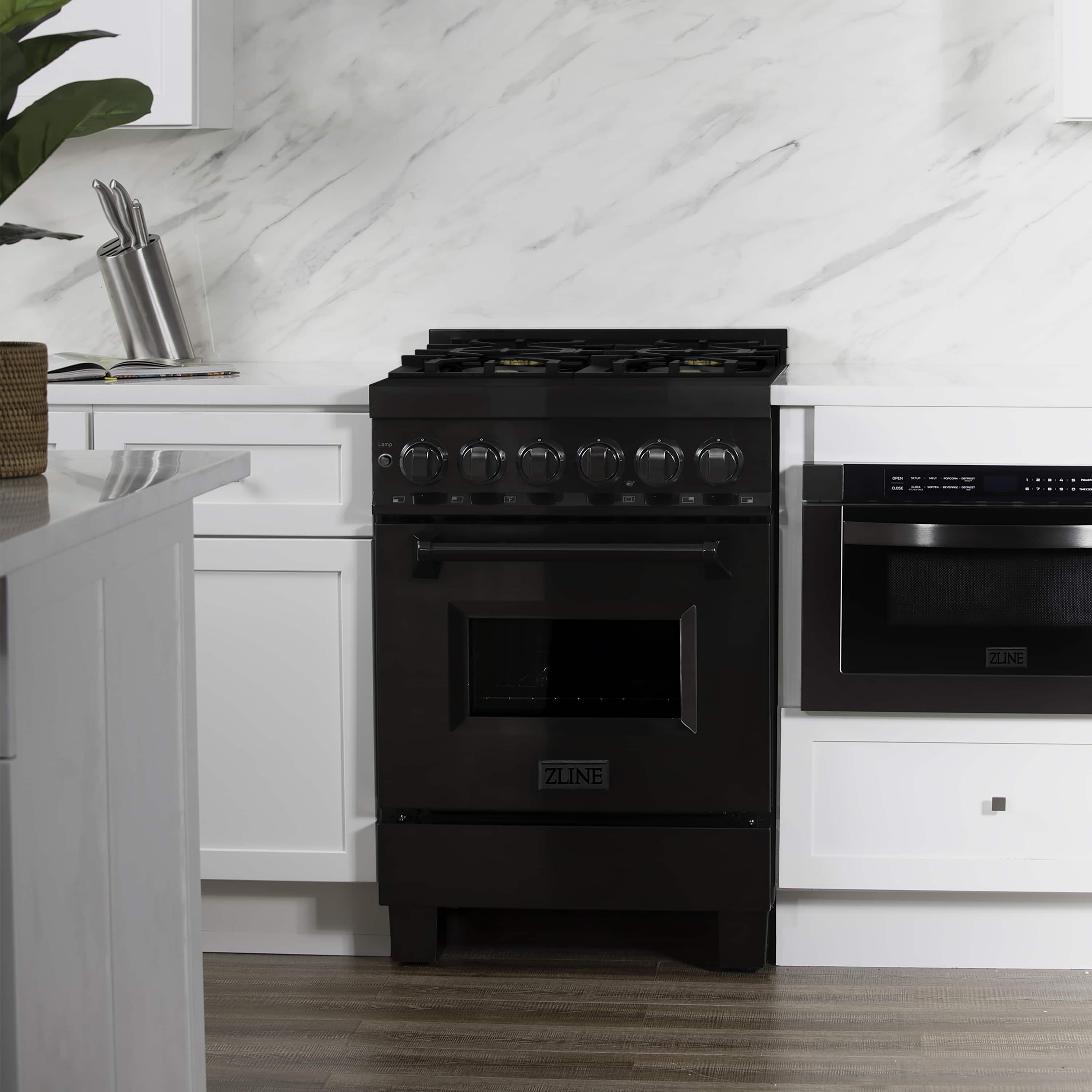 ZLINE black dual-fuel range, front view with four gas burners and oven window