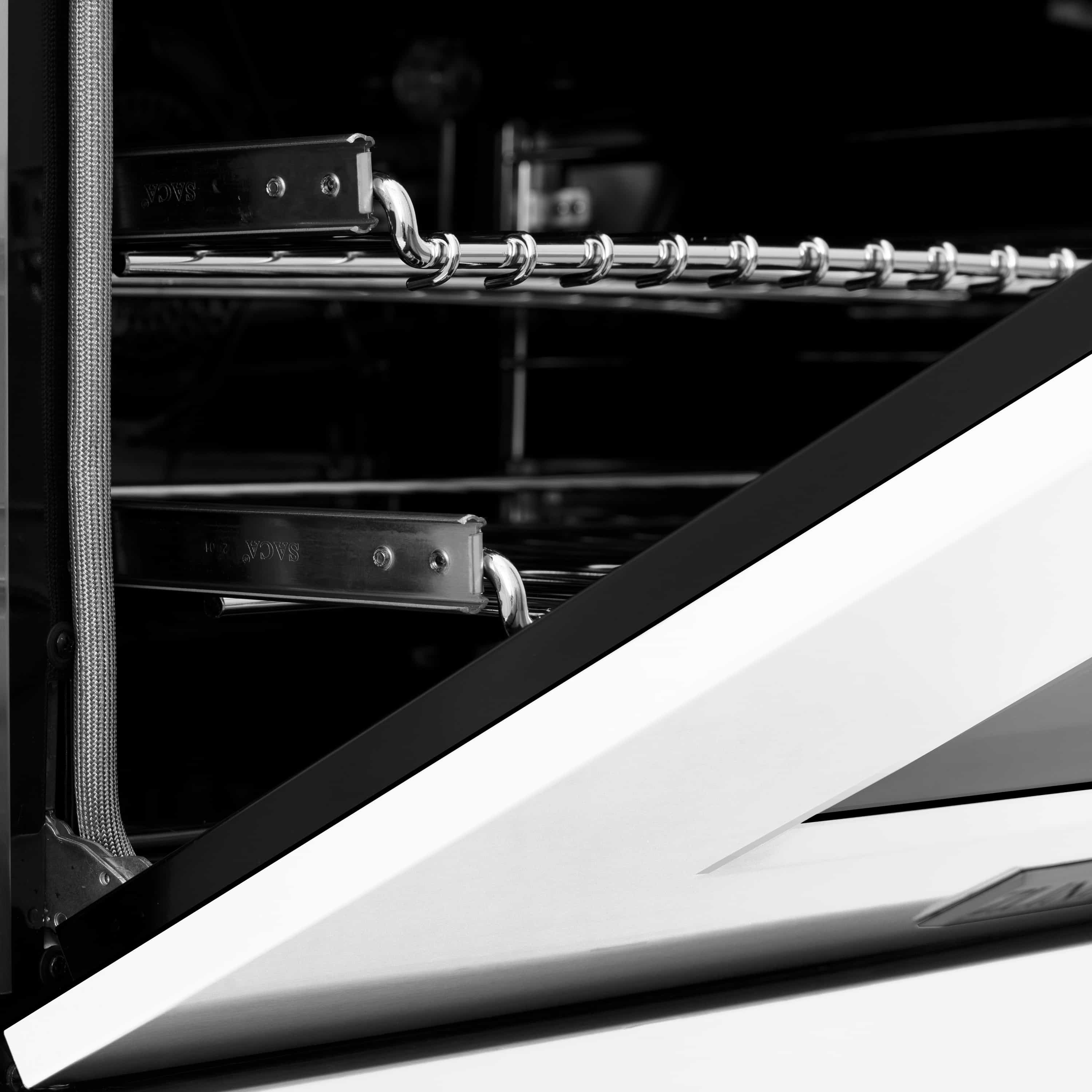 Dual fuel range oven interior with chrome racks and dual bake elements