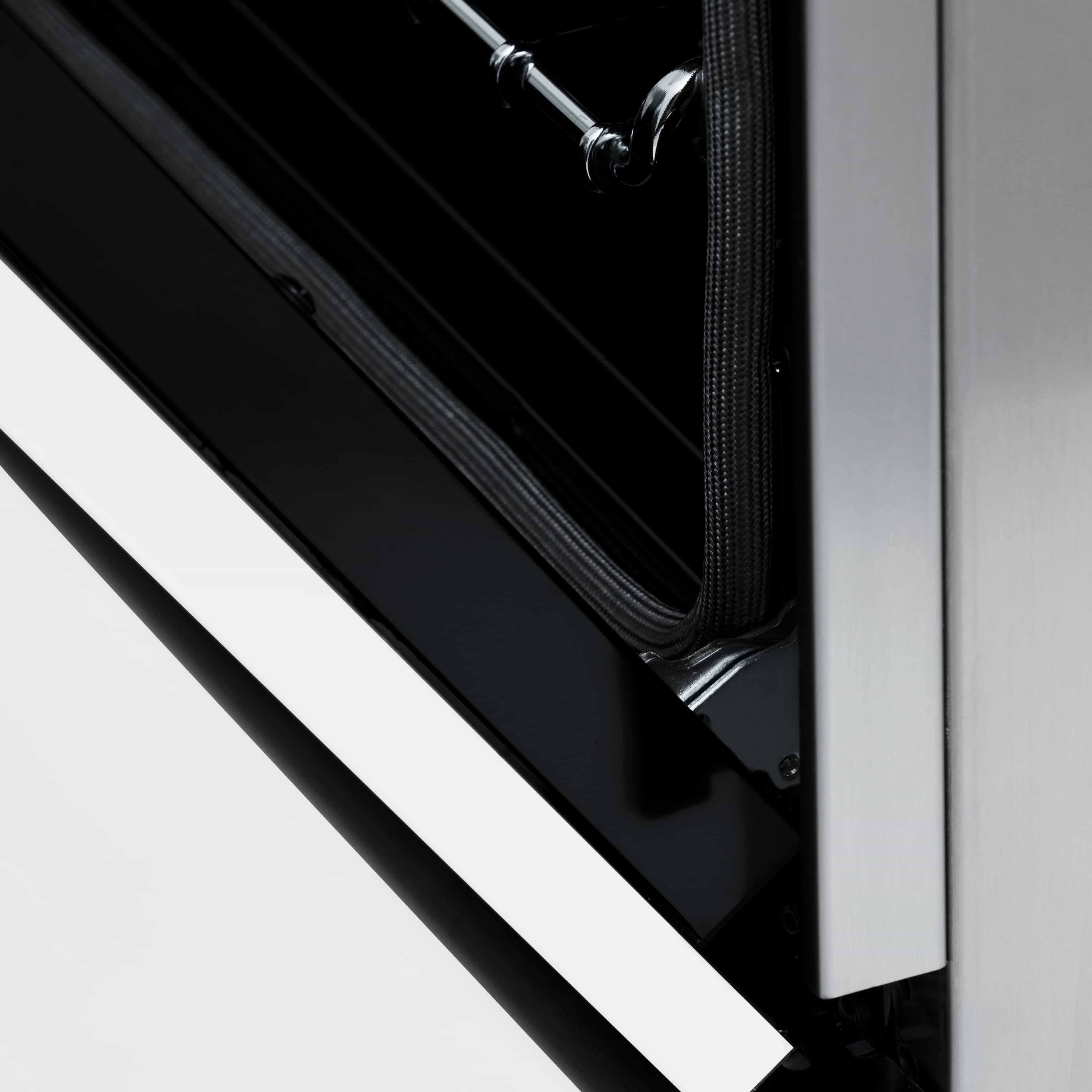 Dual fuel range oven door edge and interior window frame in stainless finish.