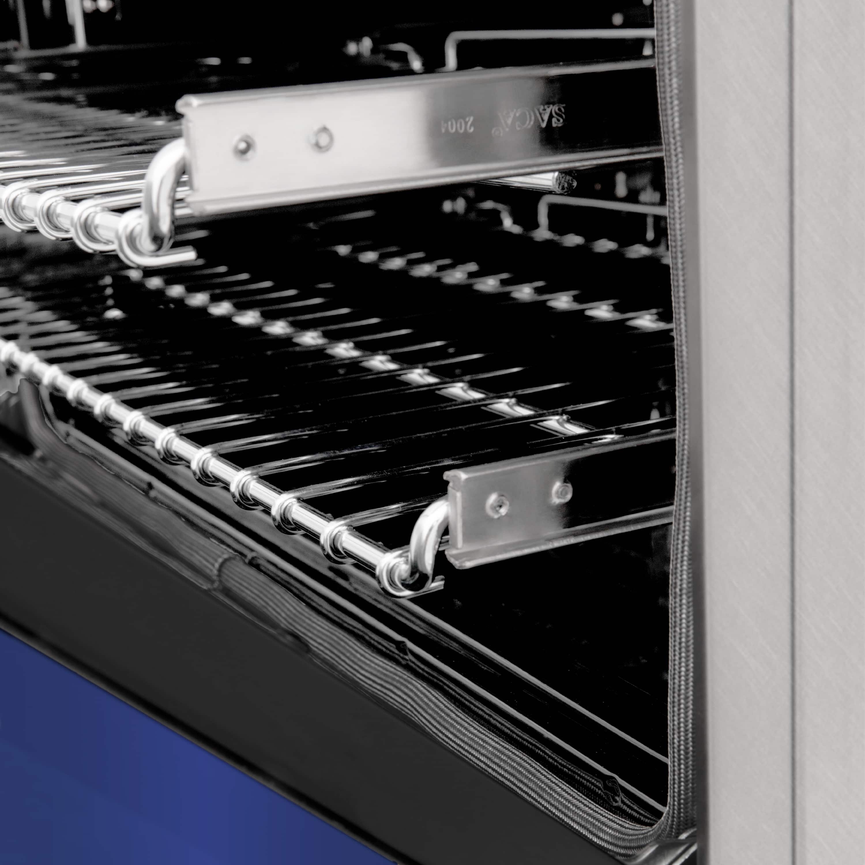 Dual fuel range cooktop with black grates and satin stainless control panel