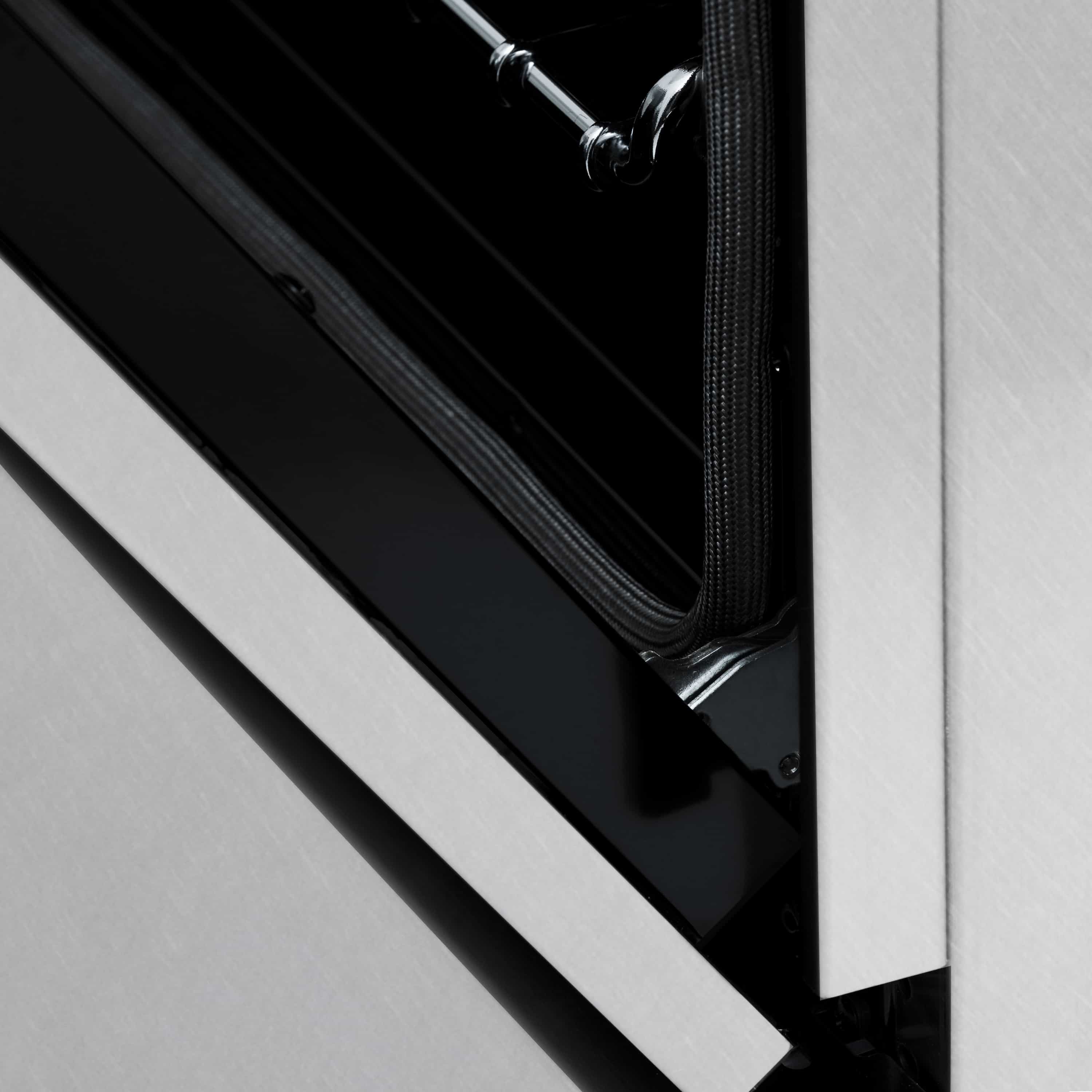 Oven door side with satin stainless steel trim and black mesh panel