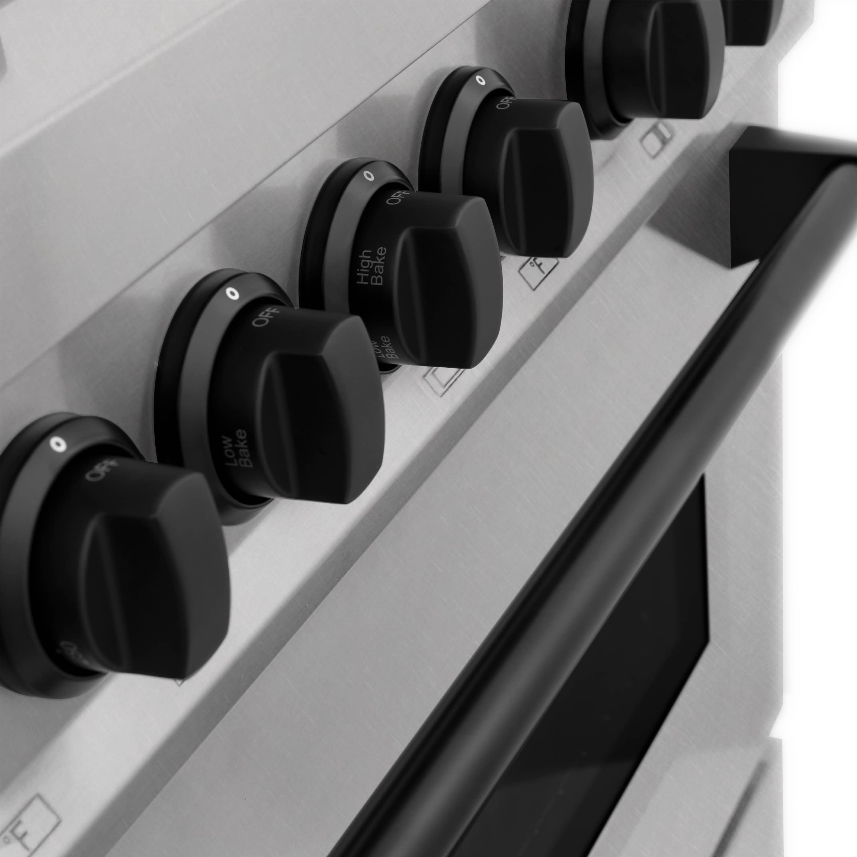 Row of black control knobs with white setting marks on stainless panel