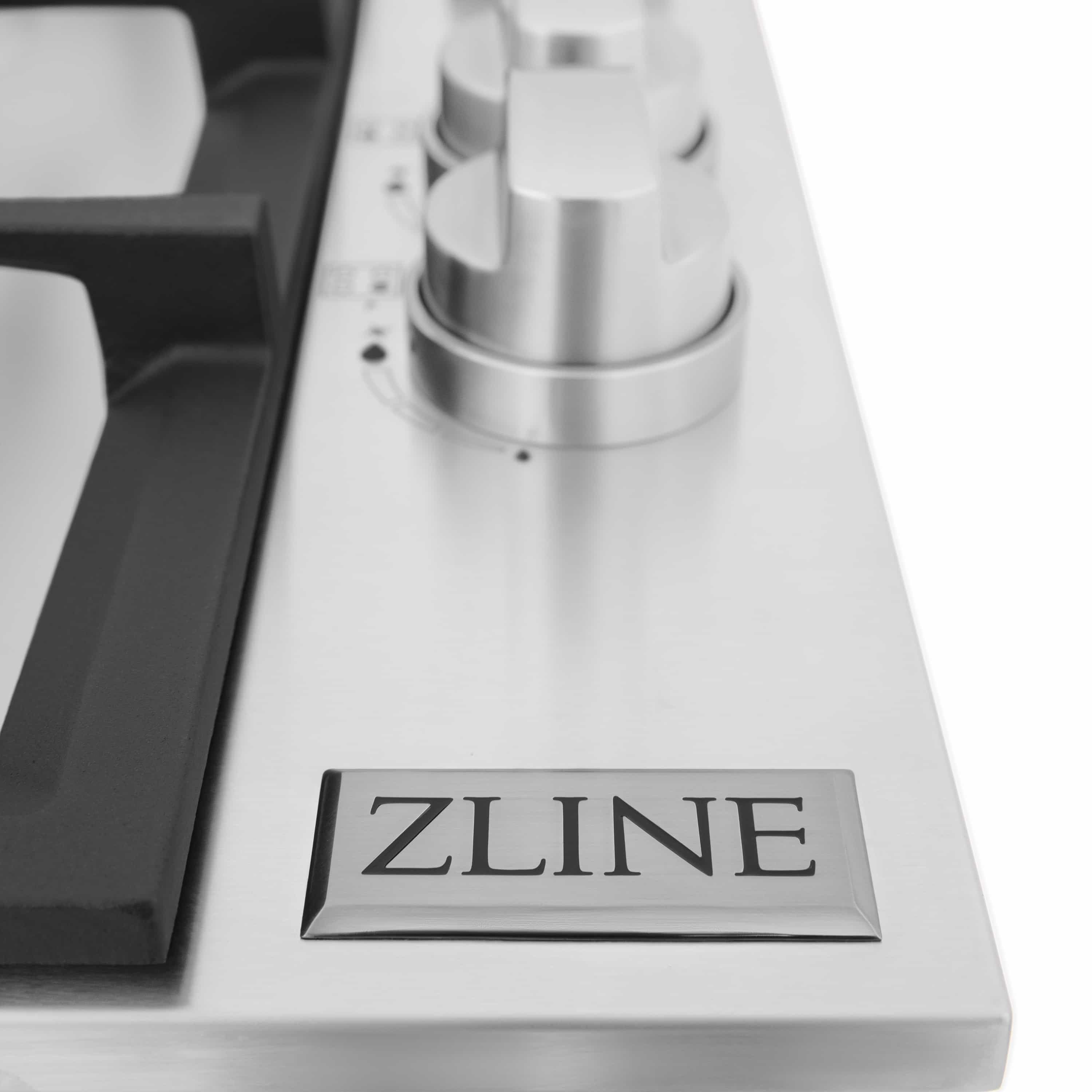 ZLINE gas cooktop control knob area with brushed metal finish and ZLINE badge
