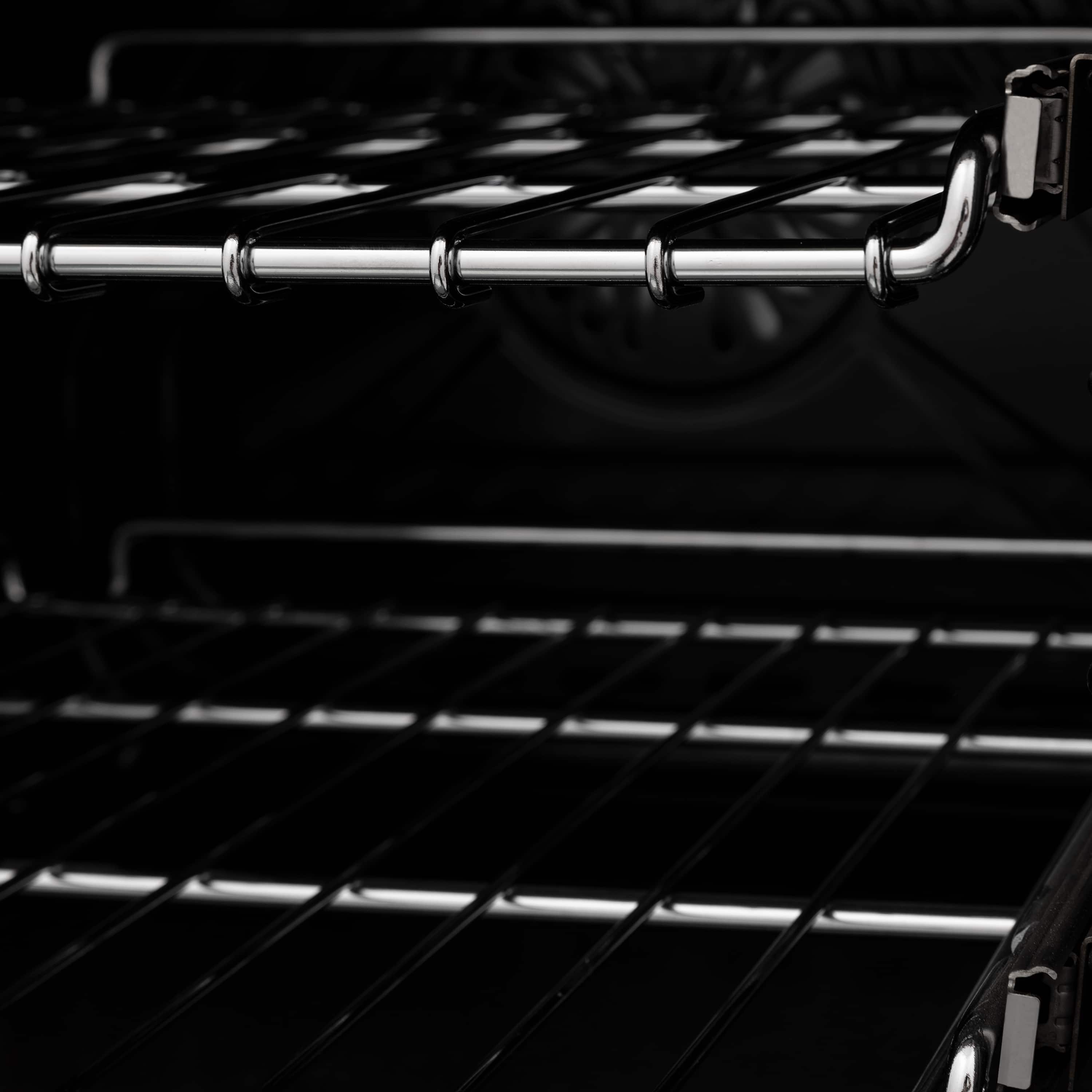 Gas oven interior rack and chrome rails inside the baking chamber