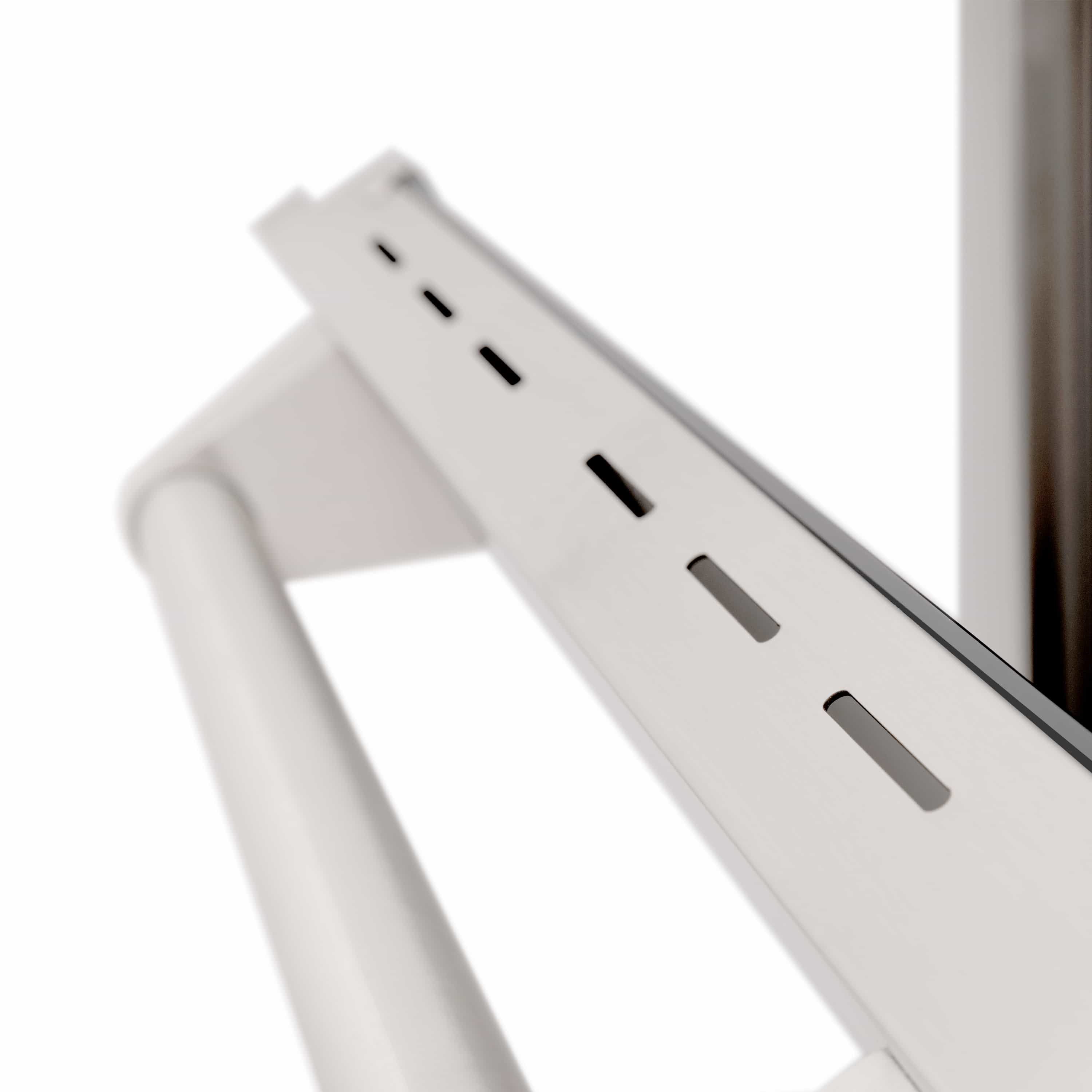 Range top vented panel with long rectangular slots in stainless finish