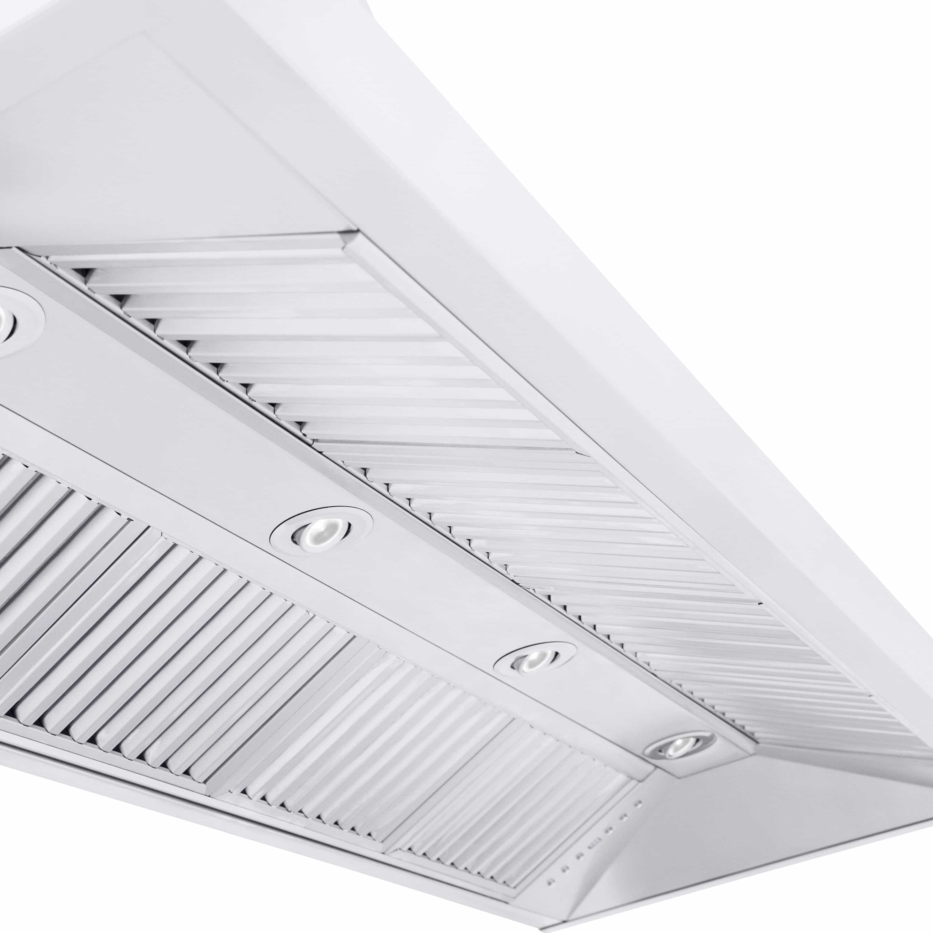 Convertible vent range hood underside with vent grilles and three recessed light spots