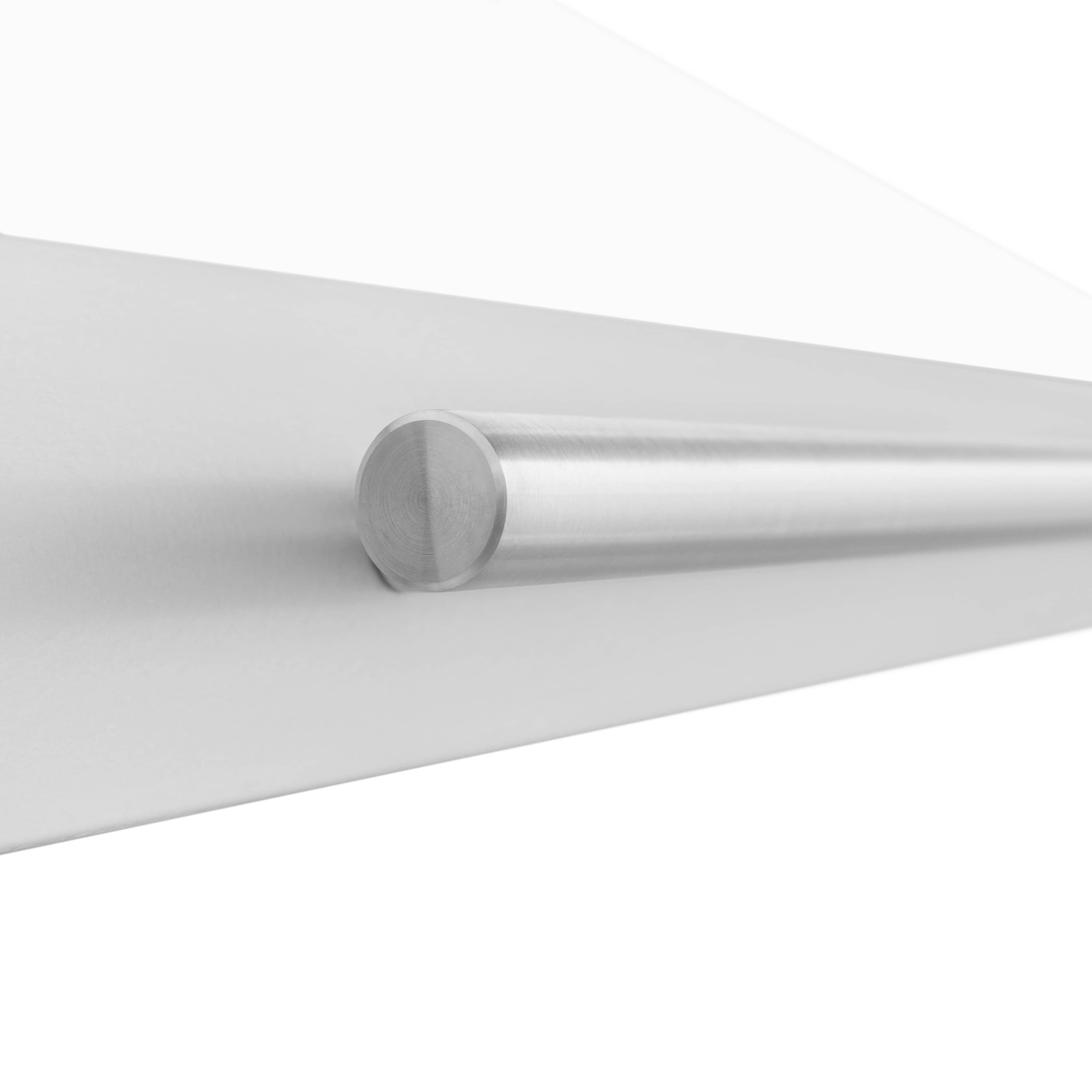 Stainless steel round duct outlet on white range hood canopy underside