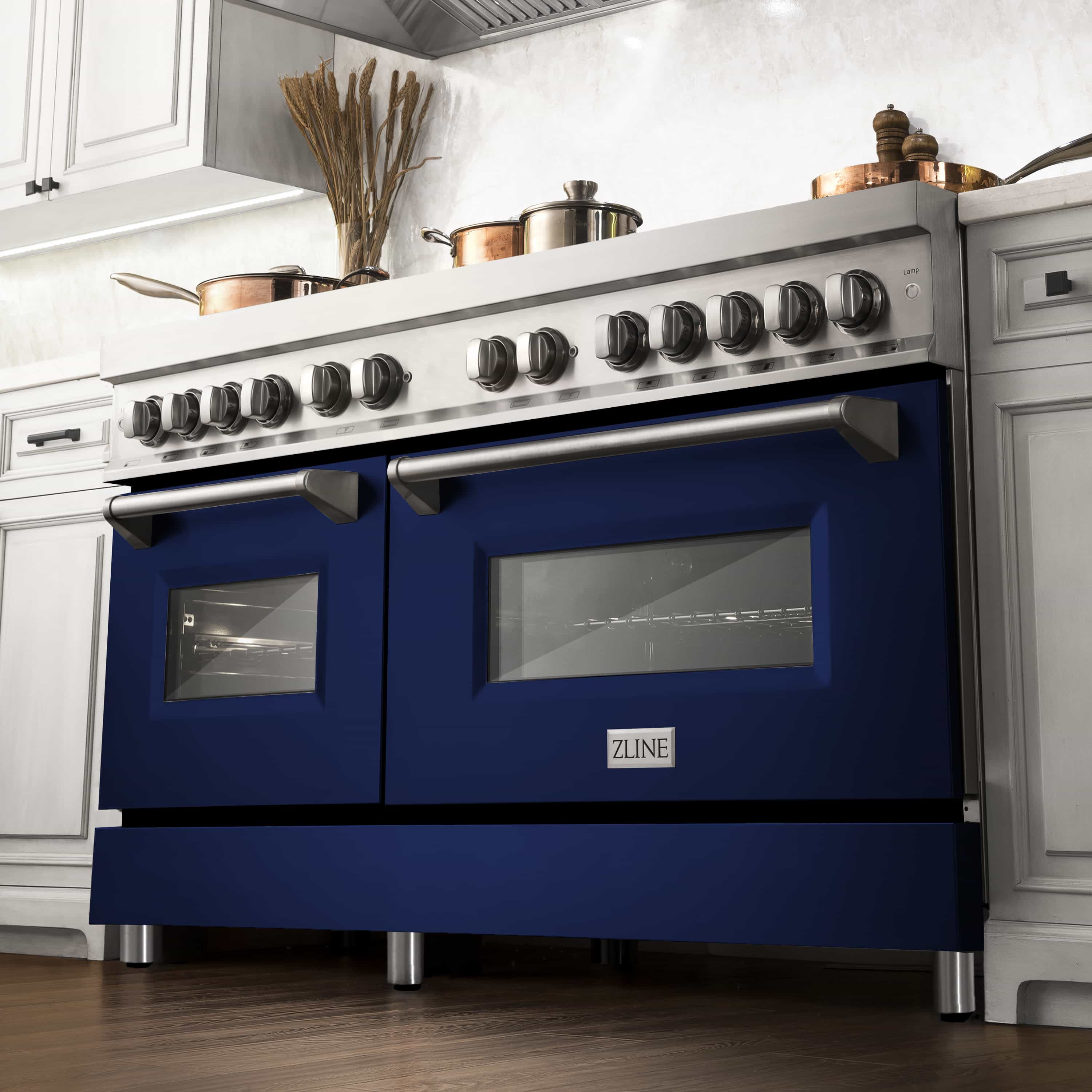 ZLINE dual fuel range in blue and stainless with multiple oven control knobs