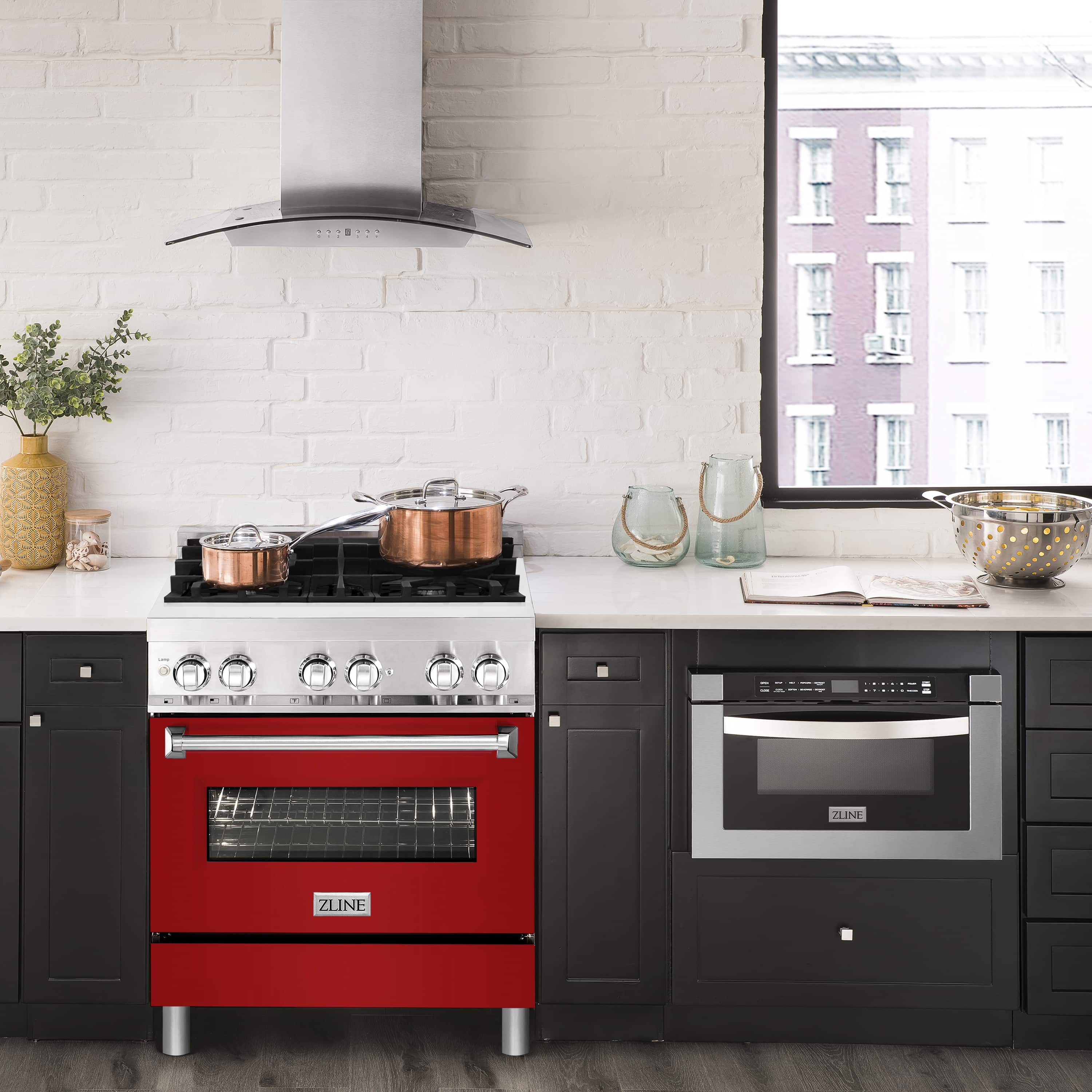 ZLINE dual fuel range with black cooktop and red oven door