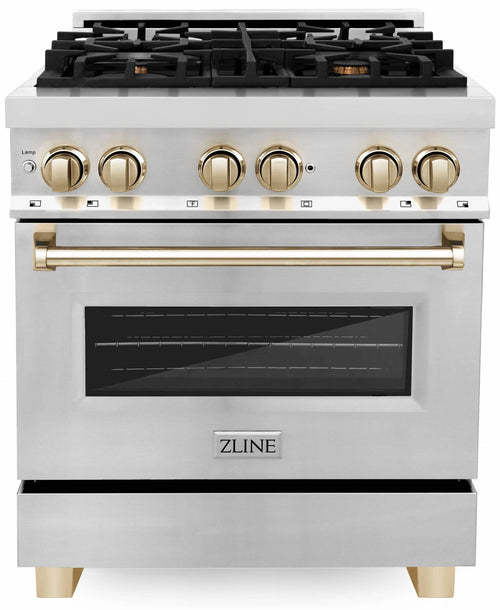 White dual fuel range front with gold control knobs and oven door