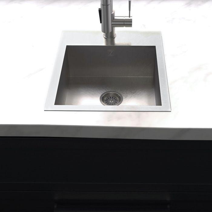 Stainless steel single-bowl topmount sink with centered drain strainer