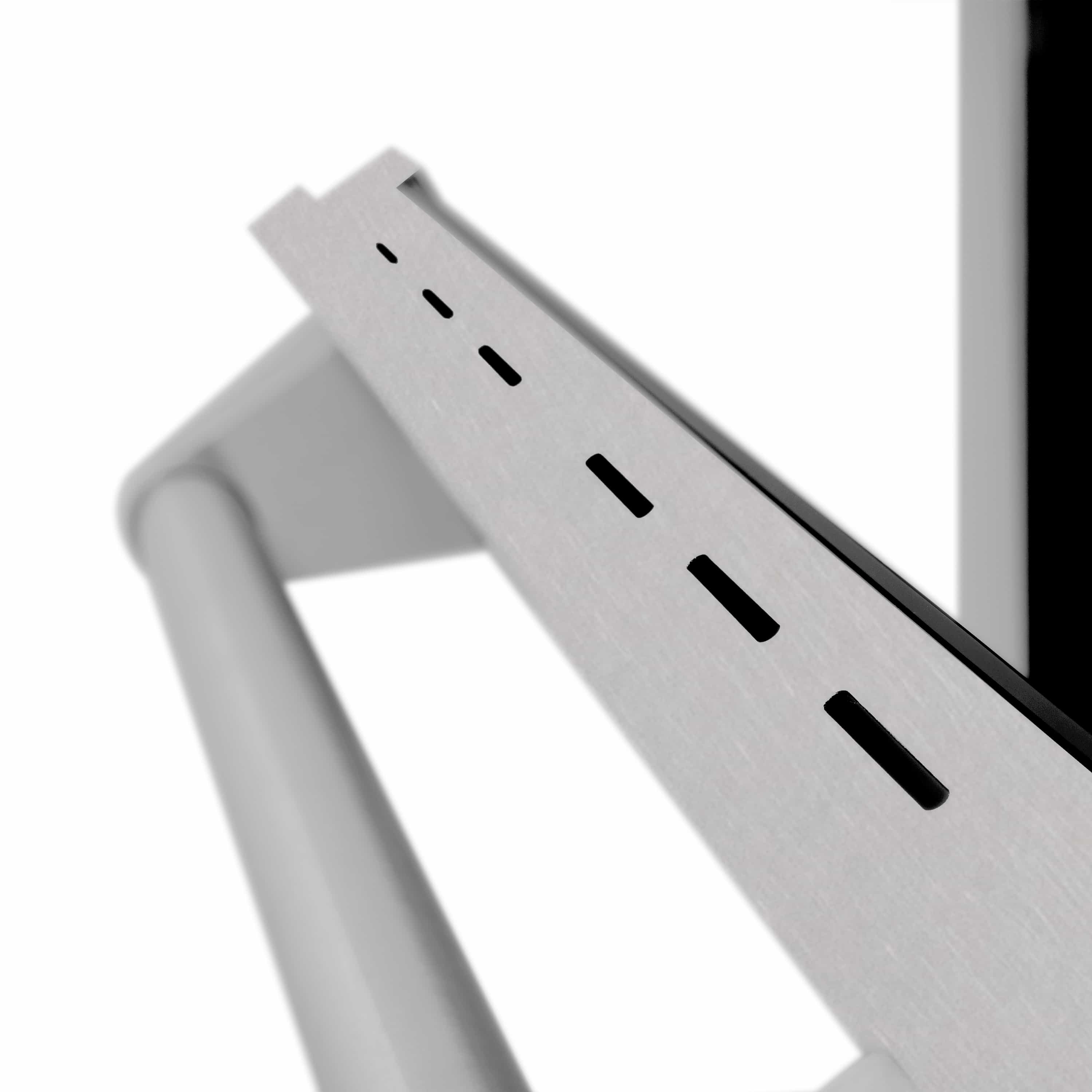 Stainless steel side control panel with ventilation slots and black window