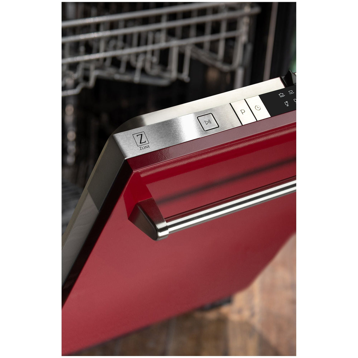 Red gloss dishwasher door with stainless handle and control panel on top