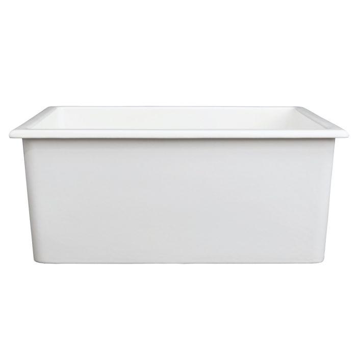White fireclay single-bowl kitchen sink with rectangular shape and sloped basin