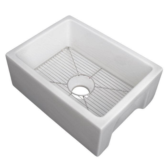 White fireclay single-bowl sink featuring stainless bottom grid and raised rim