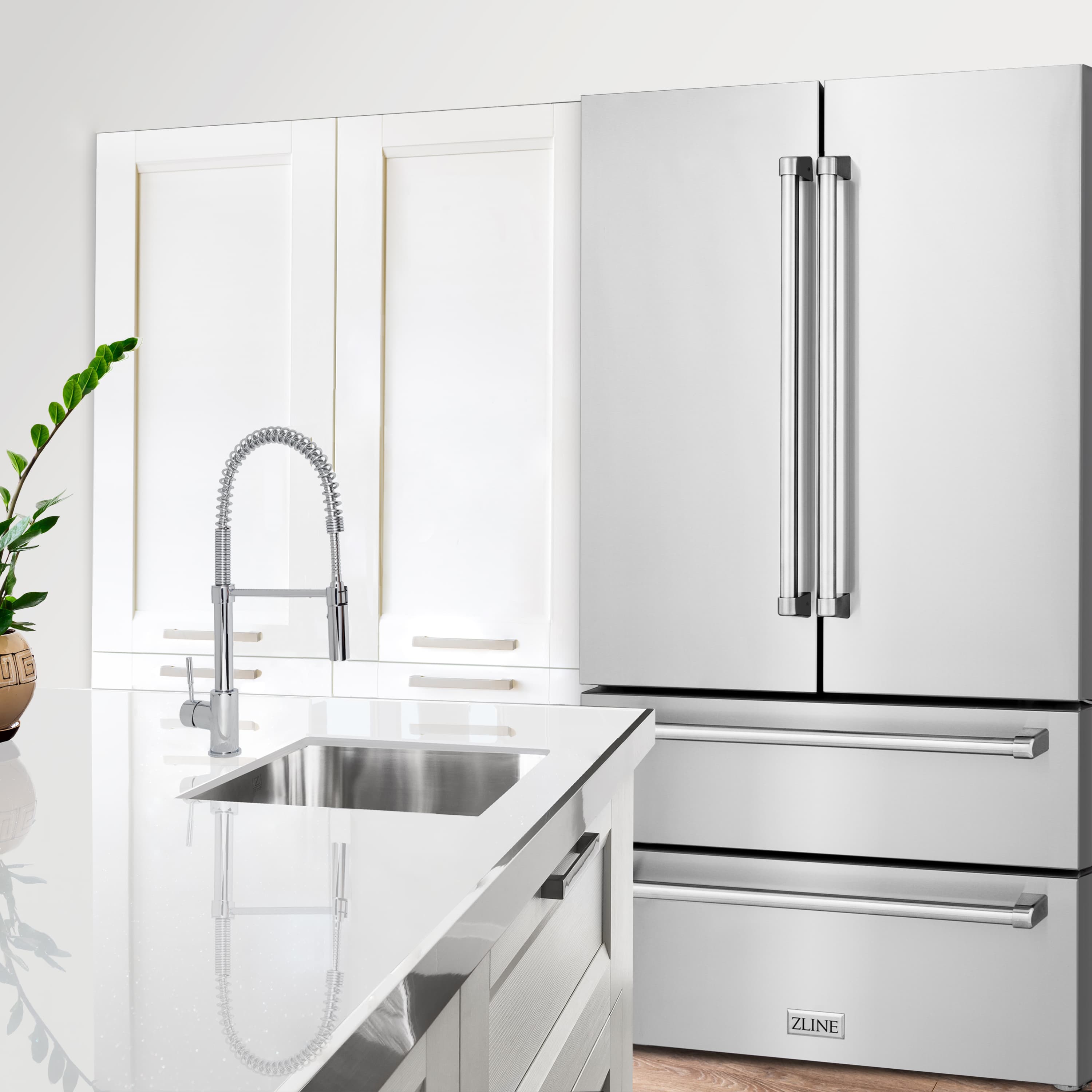 Stainless dual fuel range with cooktop and burners, shown with matching refrigerator