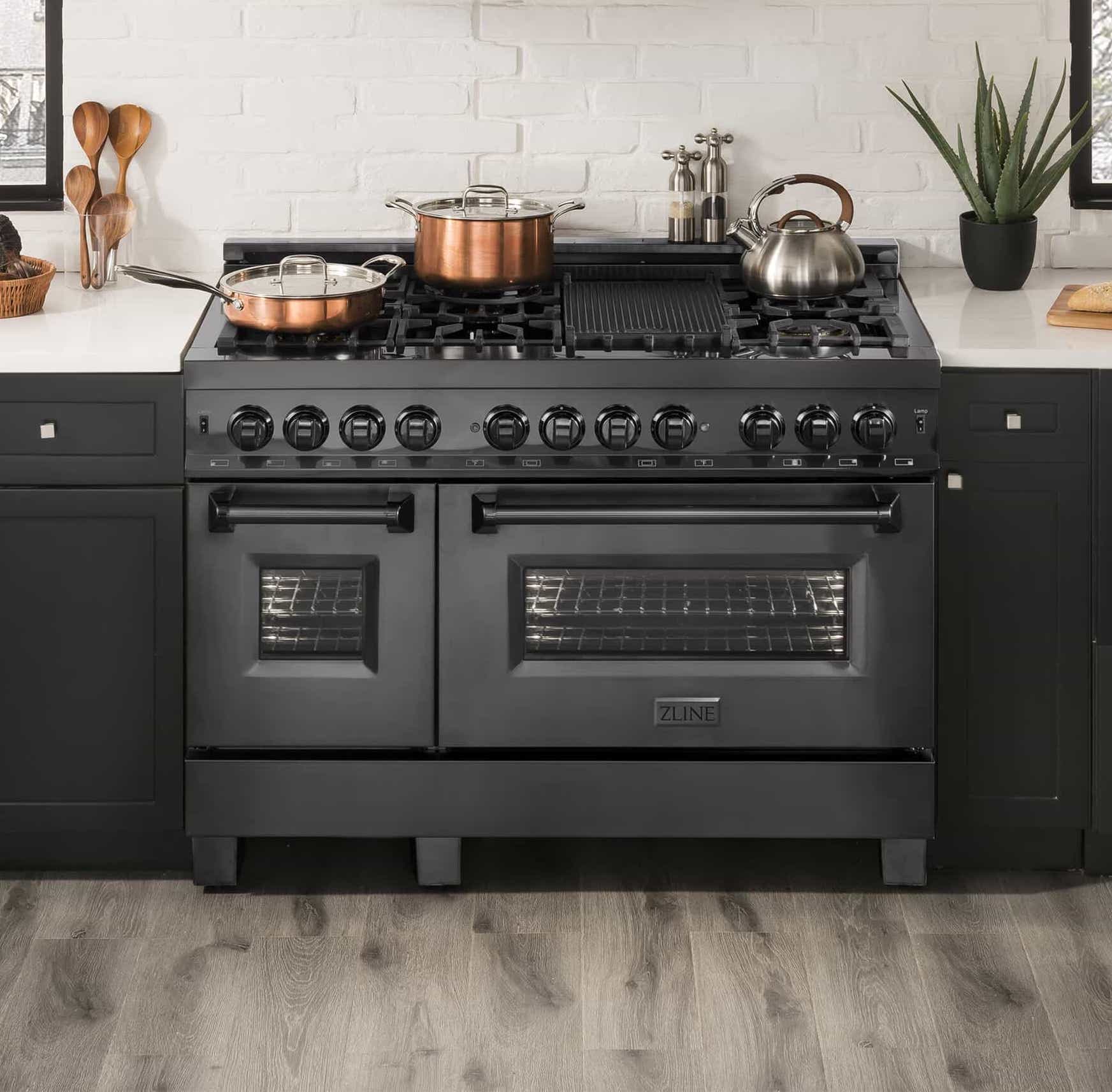 ZLINE dual fuel range with multiple burners, grates, and oven window doors