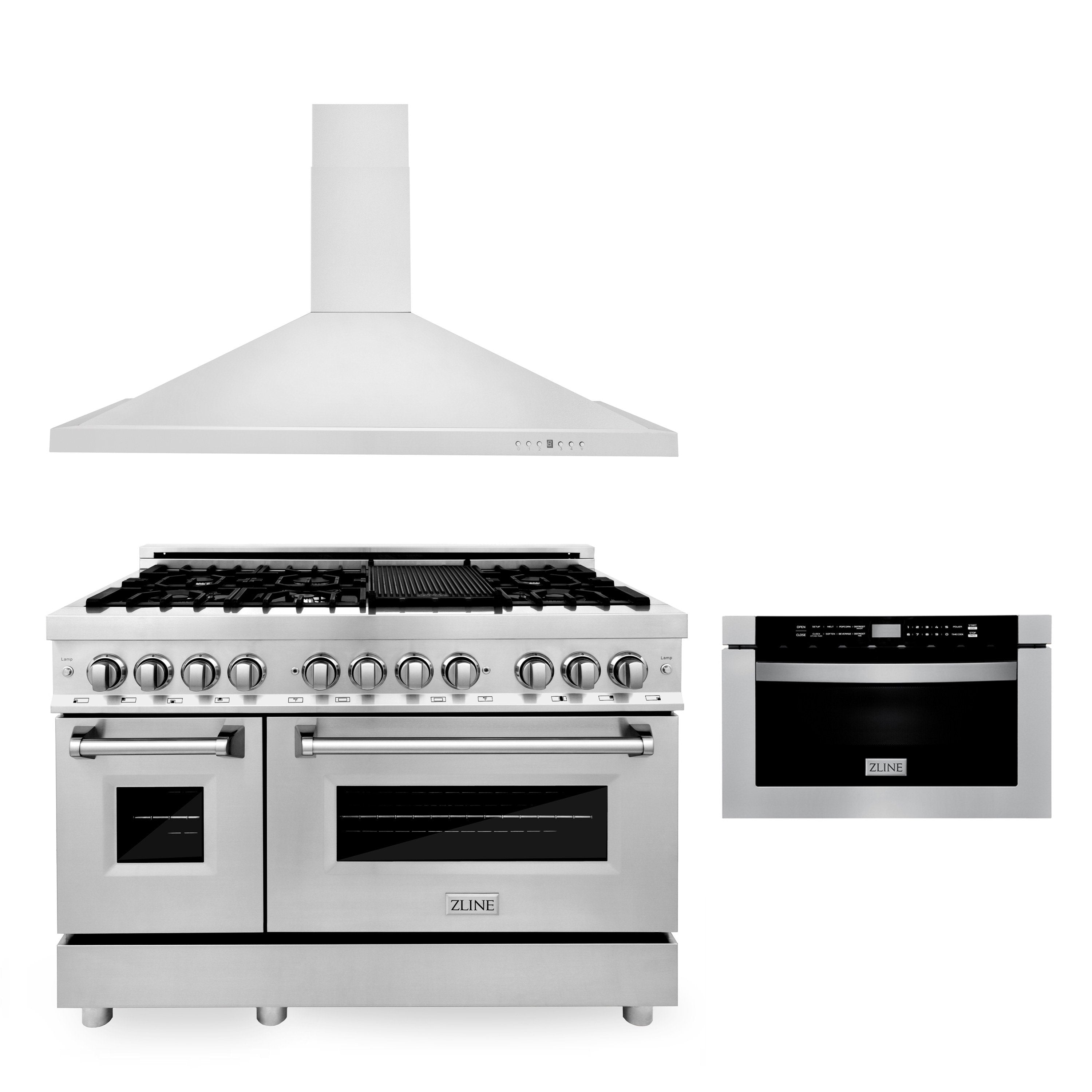 Stainless dual fuel range with chimney hood and built-in microwave drawer