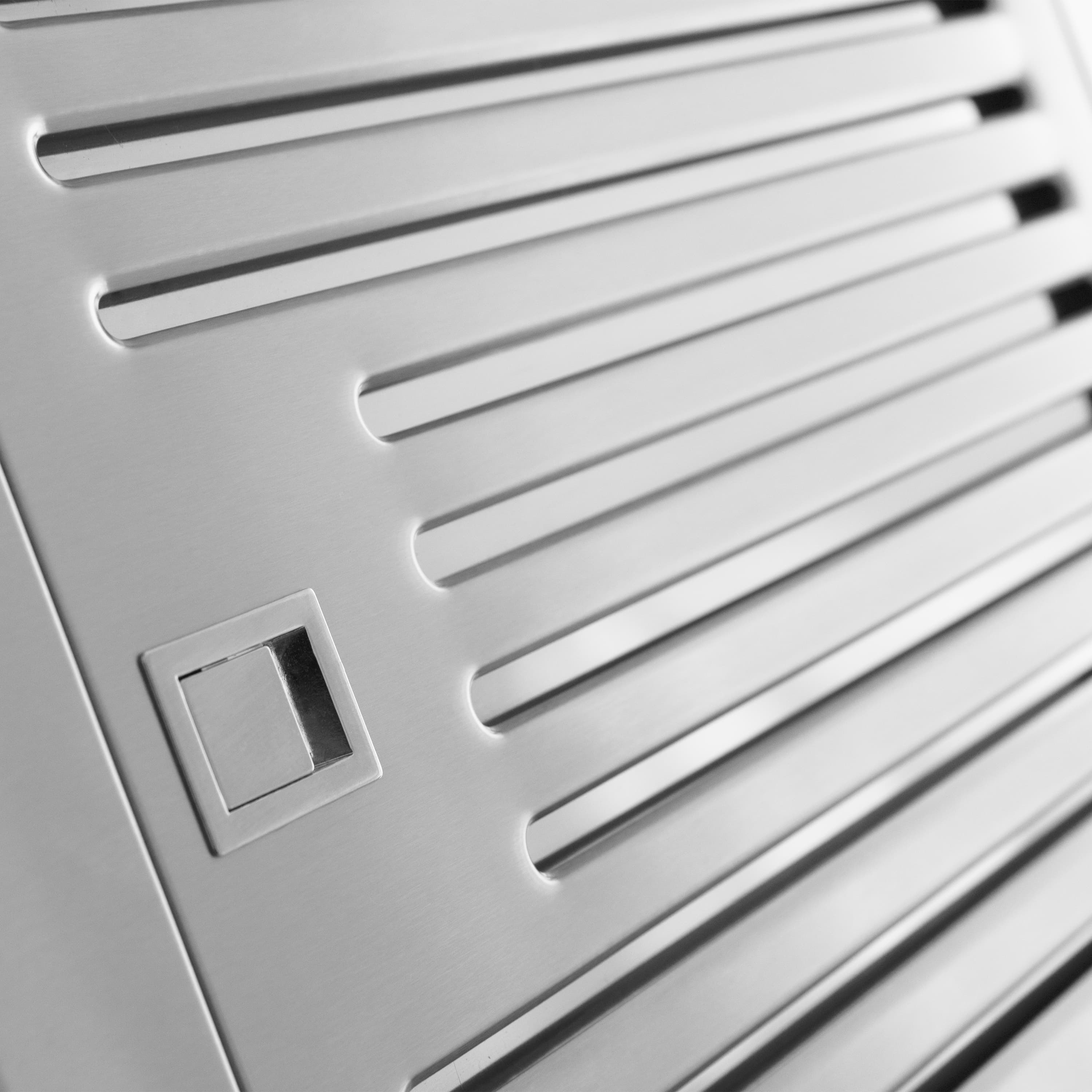 Stainless steel vent panel with rectangular filter access handle and slotted vents