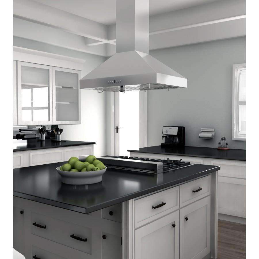 Stainless steel island mount range hood centered above cooktop in kitchen