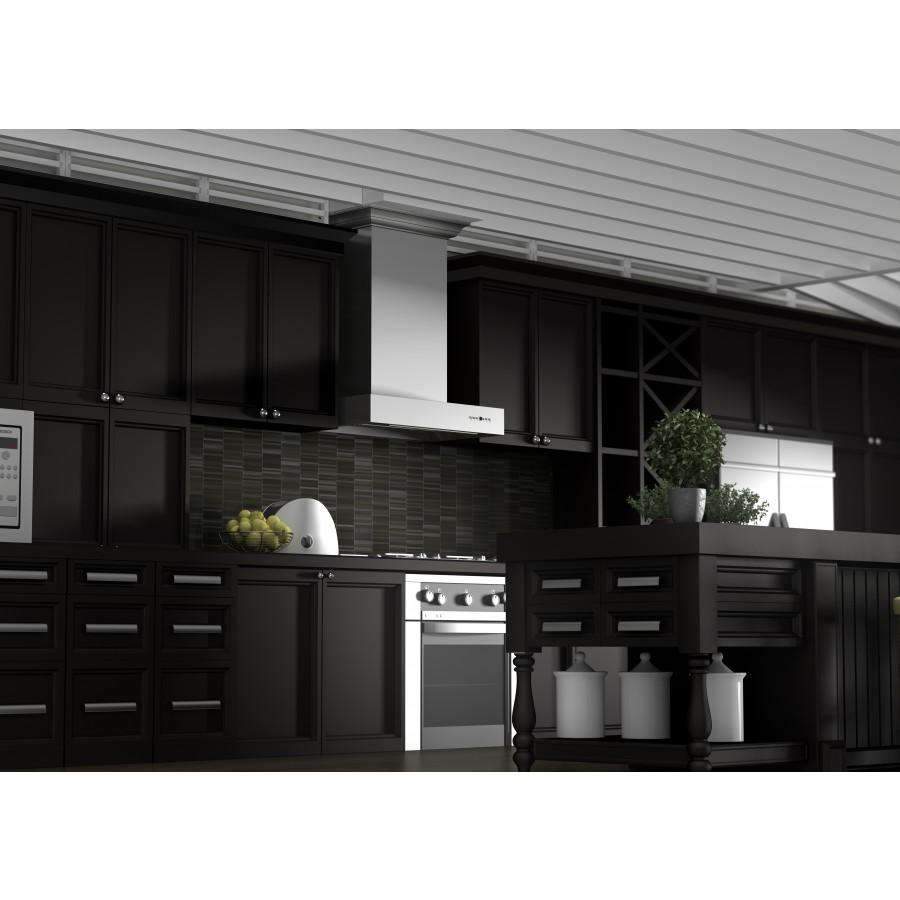 Stainless steel wall-mount range hood above built-in oven and cooktop