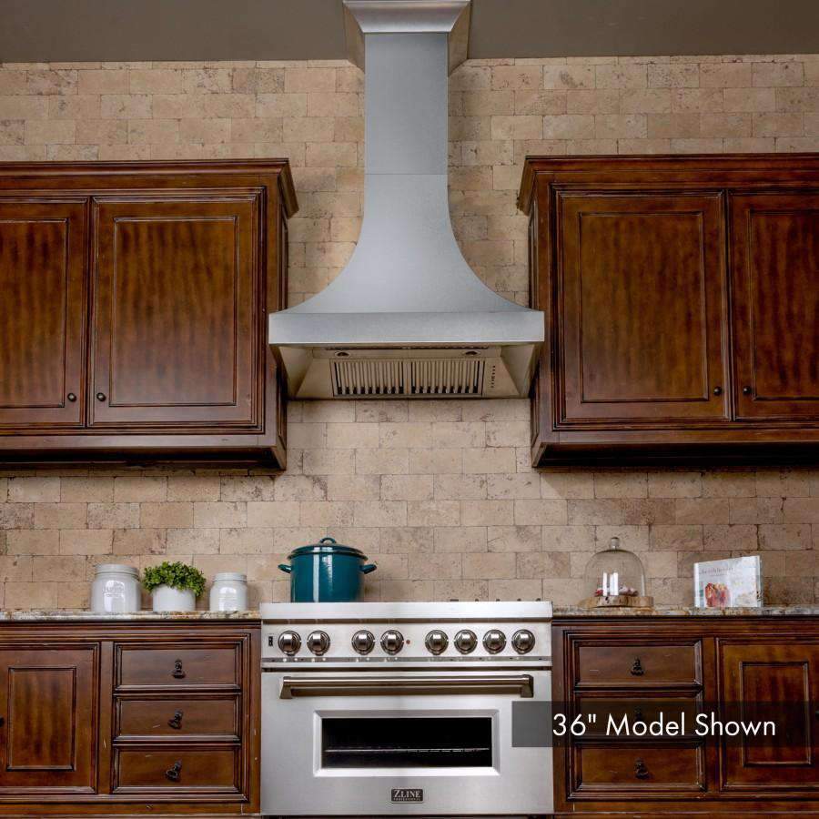 Stainless steel wall range hood with vertical chimney and under-hood vent grille