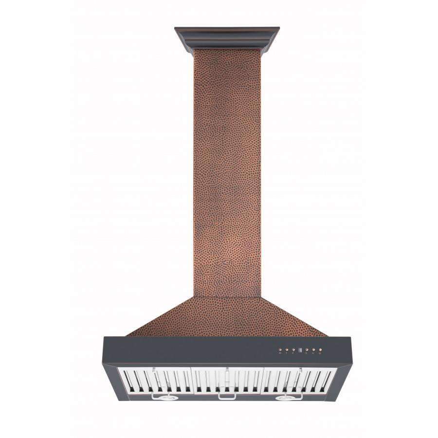 Wall range hood with hammered copper chimney and black bottom, stainless filter grates.