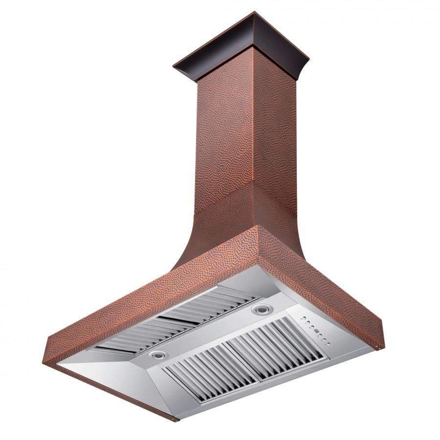 Copper chimney wall range hood with rectangular stainless vent hood and metal filters.