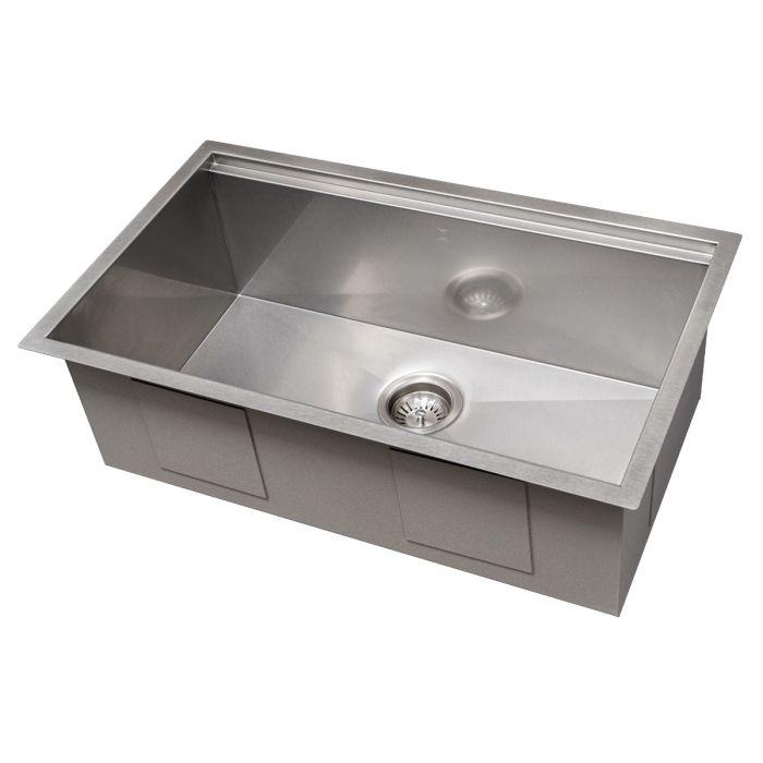 Undermount-style single-bowl stainless steel kitchen sink with centered drain