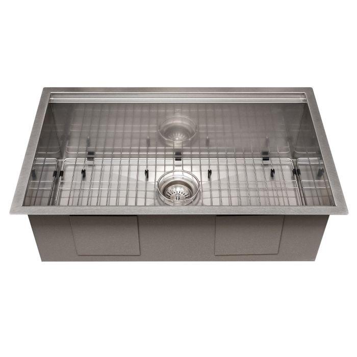 Single-bowl stainless steel sink with bottom grid and accessory pegs