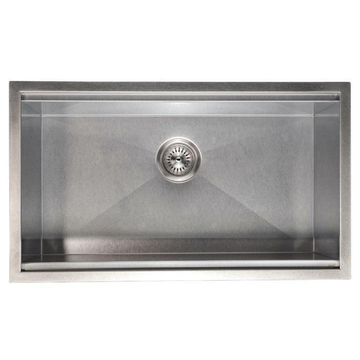 Rectangular stainless steel sink basin with centered drain