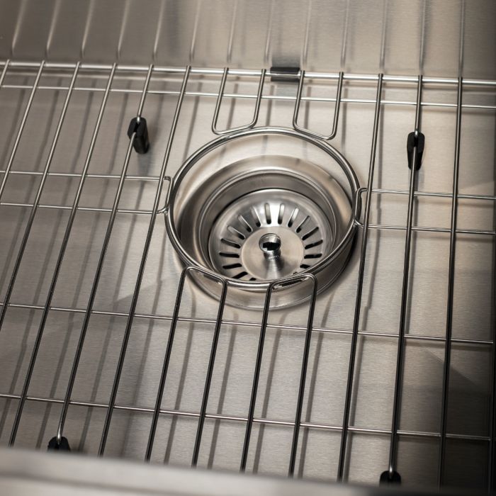 Stainless steel sink drain basket on bottom grid