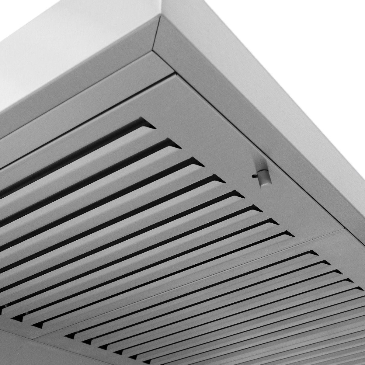 Stainless steel range hood underside with vent slats and filter grille