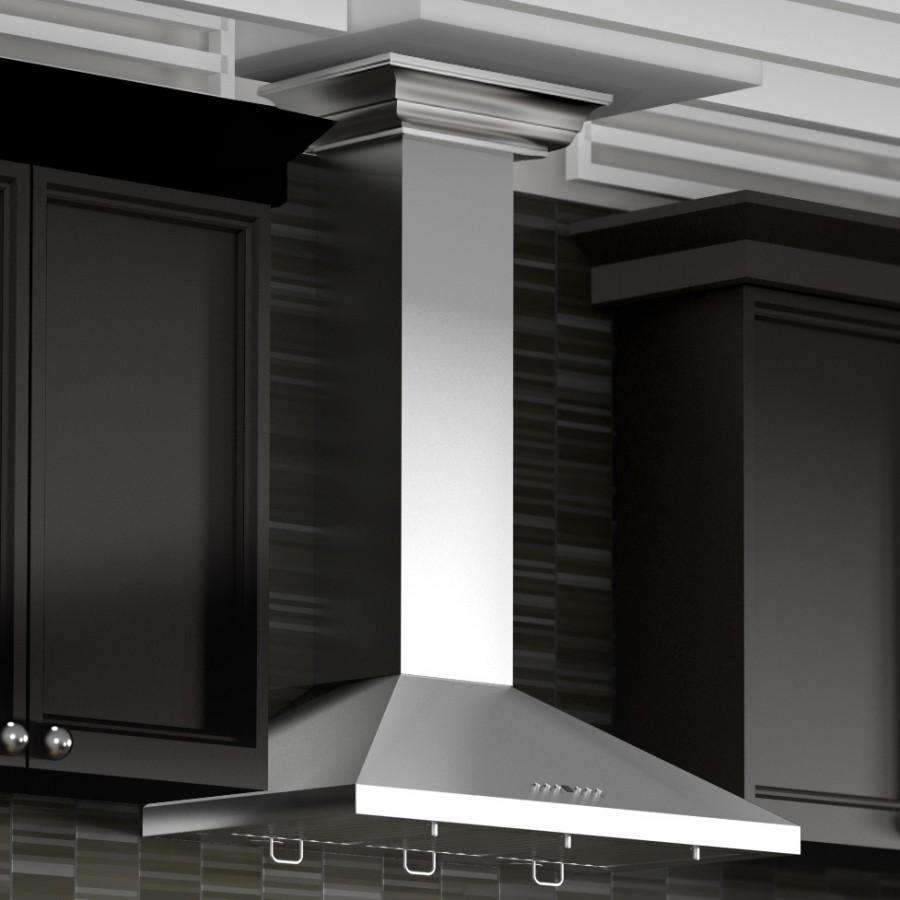 Stainless steel convertible range hood with crown molding, installed under cabinets.