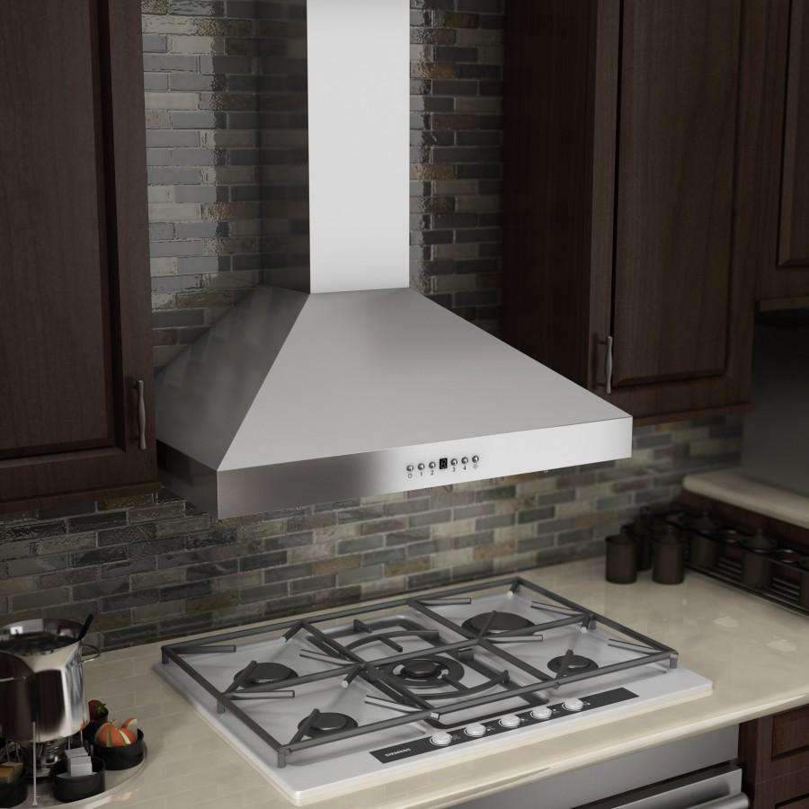 Stainless steel wall range hood above cooktop with hanging mesh baffle filters