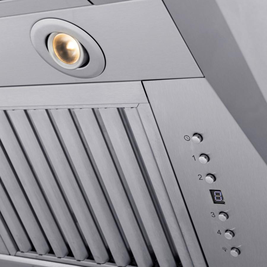 Close-up of range hood controls with lit recessed bulb and vent baffle slats