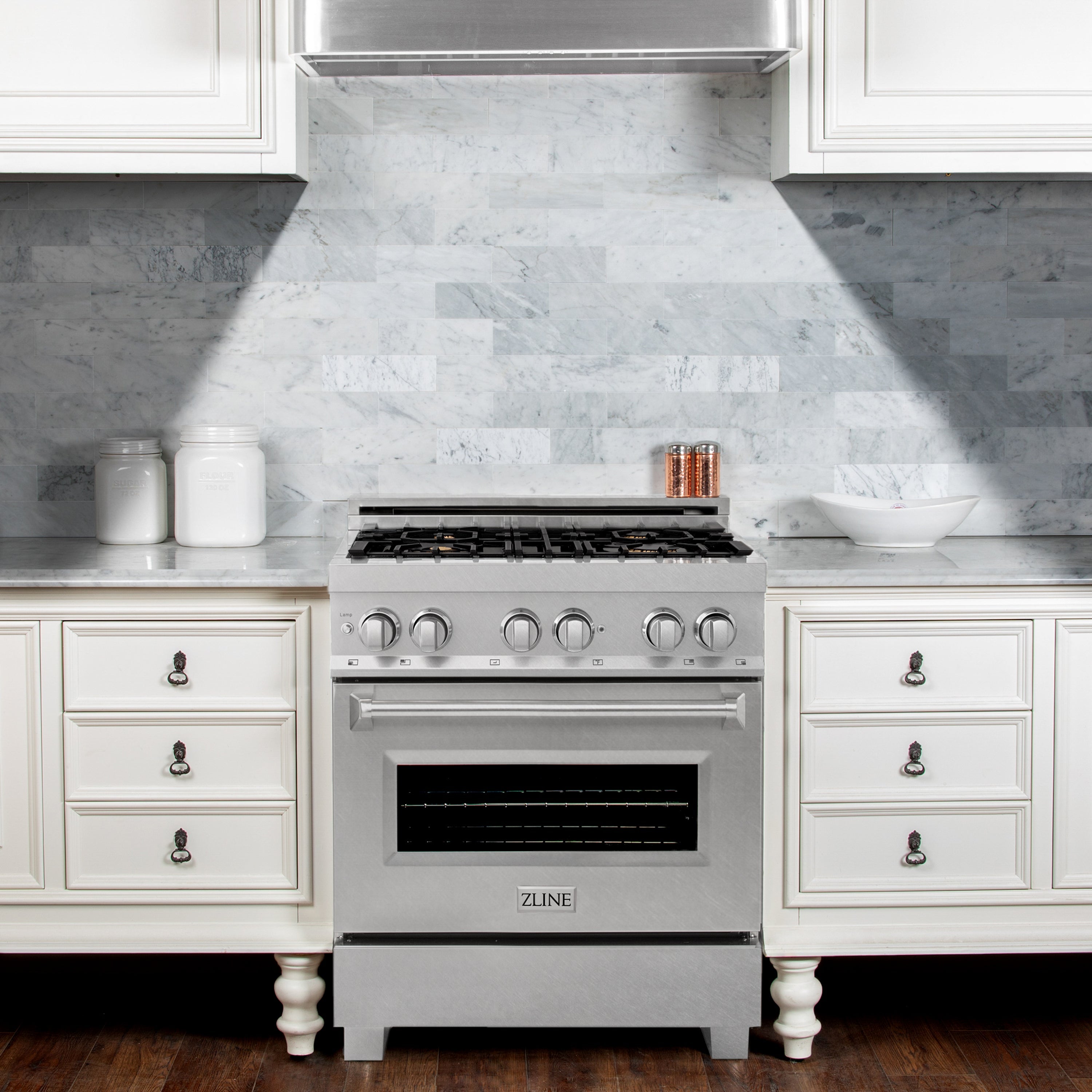 Satin stainless dual fuel range with 4 gas burners and closed electric oven