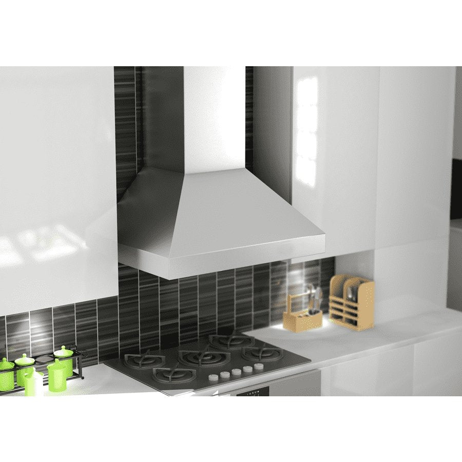Stainless steel range hood with chimney duct over black stovetop