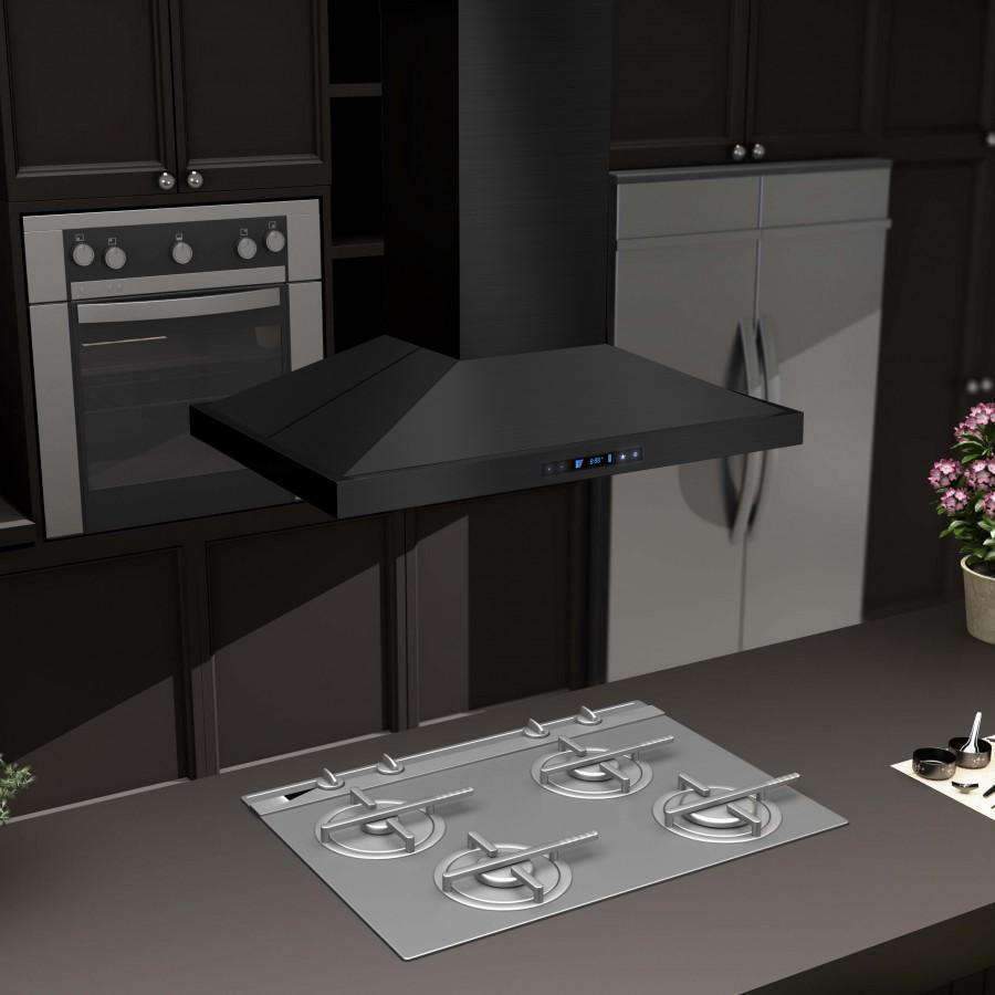 Black stainless steel island range hood canopy centered over a cooktop and griddle
