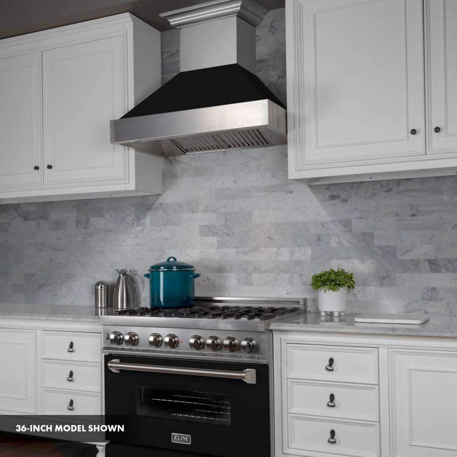Stainless steel dual fuel range with black oven door, backlit hood, and metal range back
