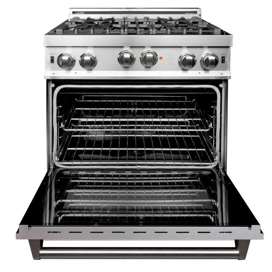 Stainless steel gas range with open oven door and wire oven racks