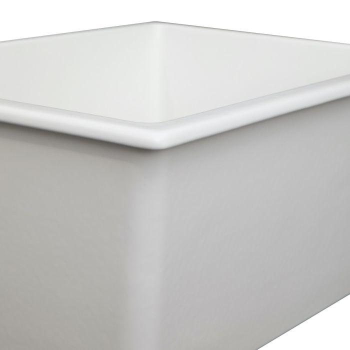 Matte white fireclay sink corner interior with smooth angled basin walls