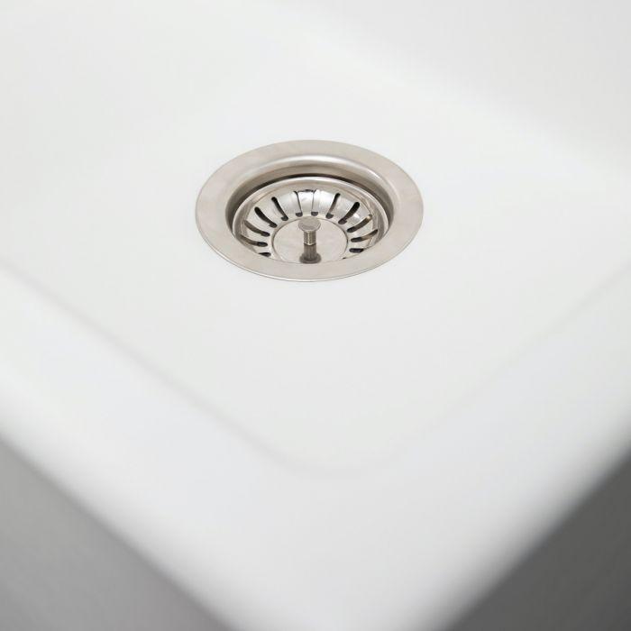 Matte white sink basin with stainless drain strainer and circular stopper