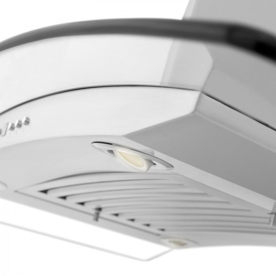 Close-up of stainless island range hood vent panel with recessed light