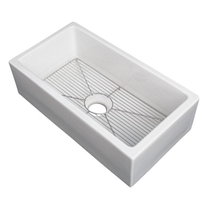 White rectangular single-bowl fireclay sink with centered drain hole