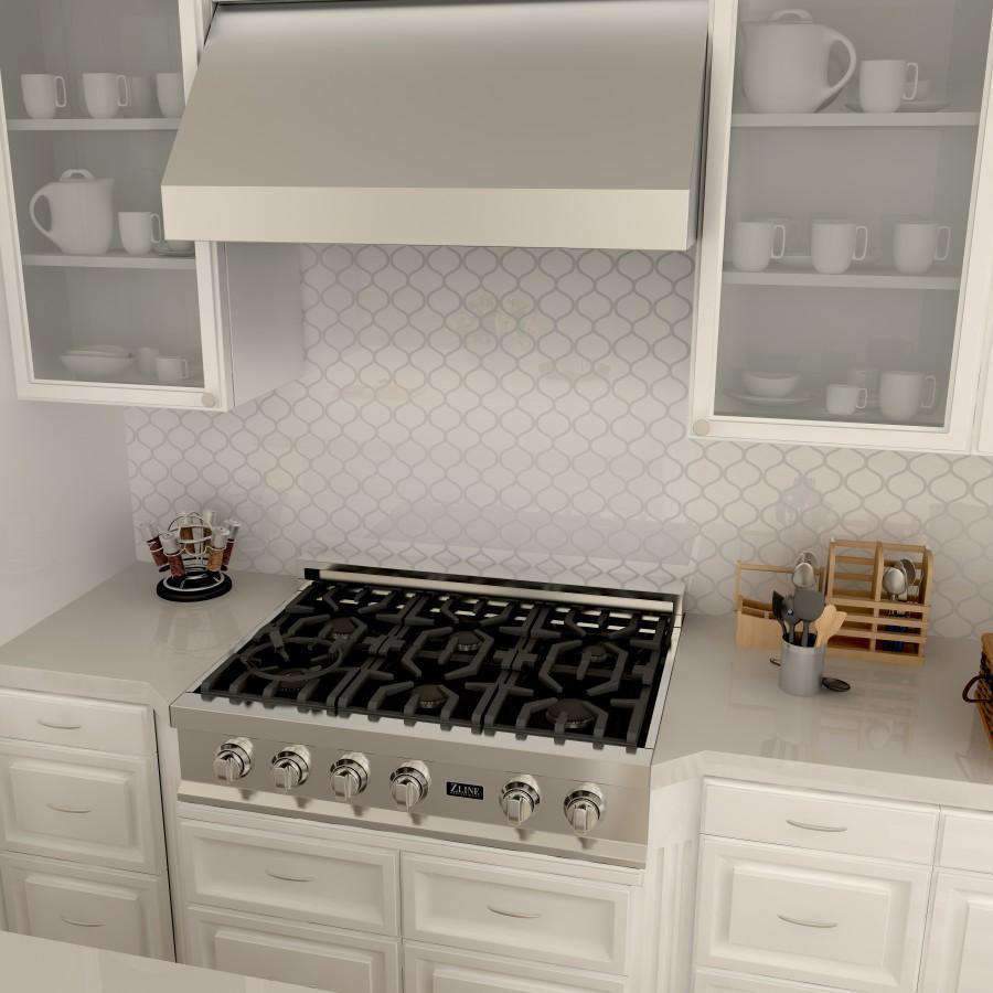 Under-cabinet range hood over a gas cooktop with cabinet storage on both sides