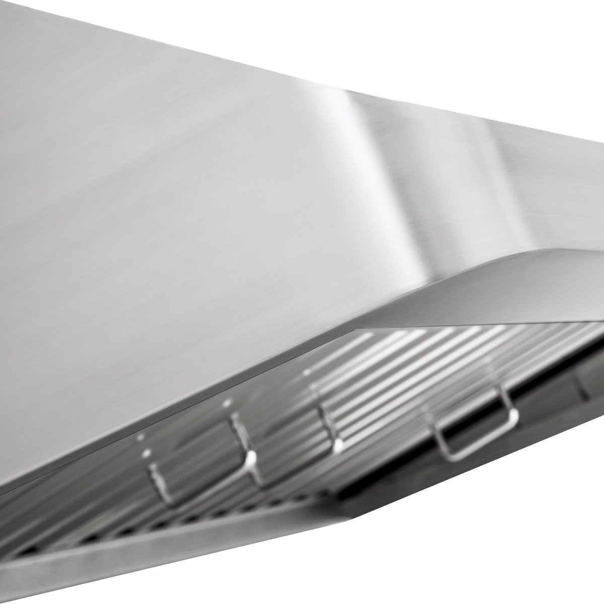 Close-up of stainless steel range hood baffle and underside air grilles
